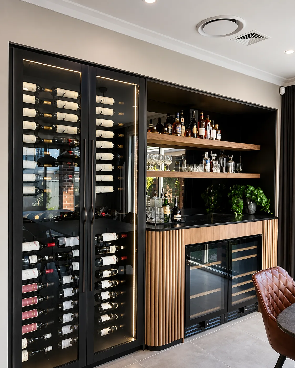 Custom bar joinery with timber battens, shelving and wine storage
